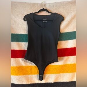 Black short sleeve body suit